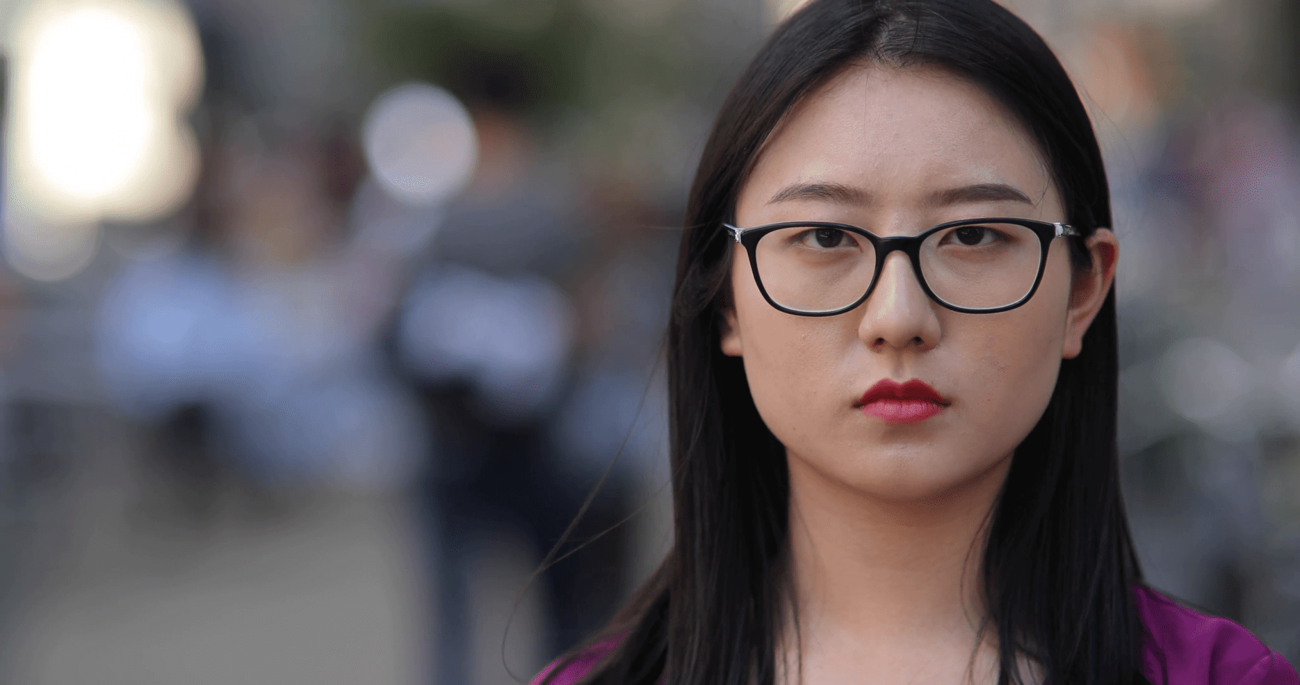 young asian woman serious face portrait
